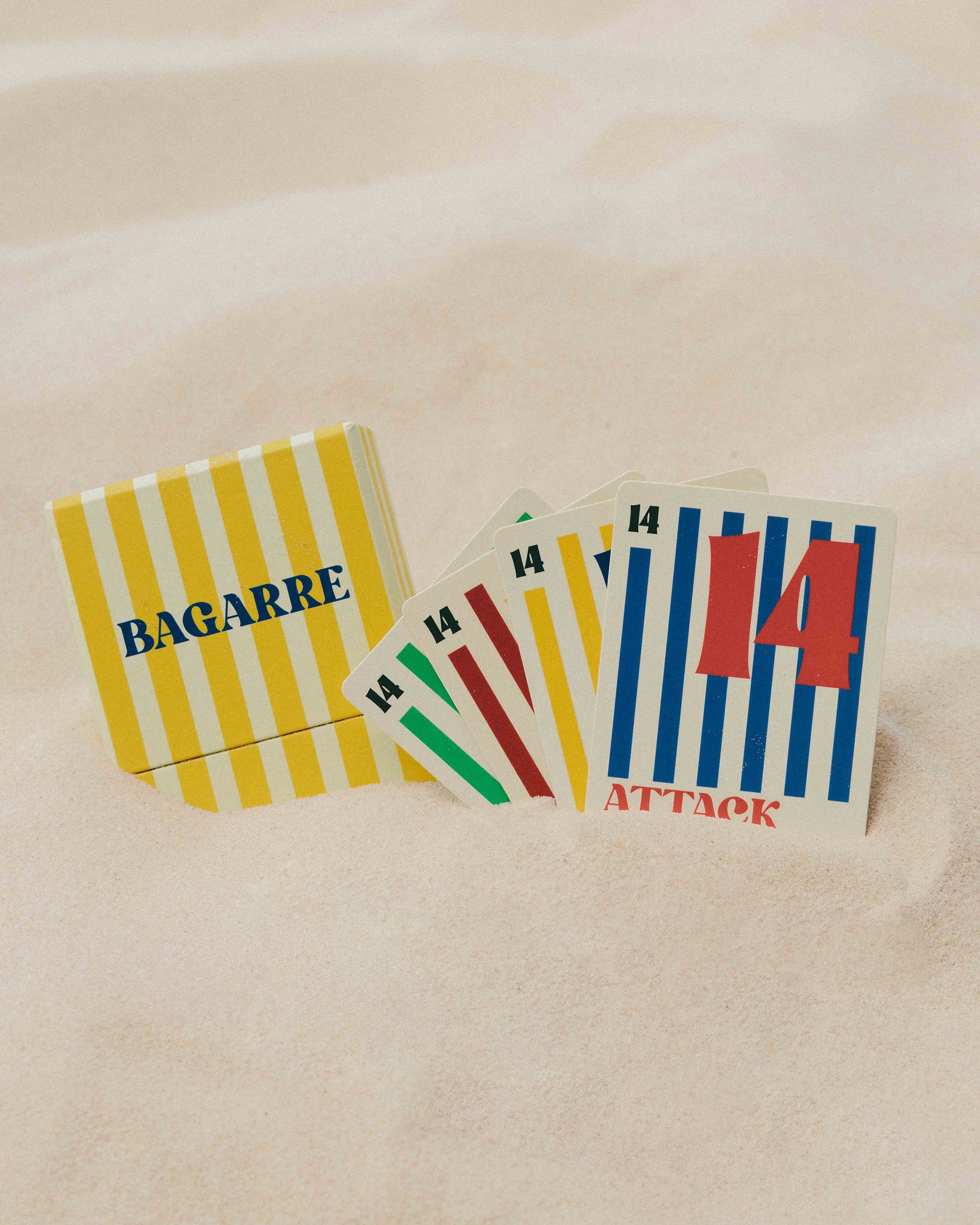 Colorful playing cards with text on a beige surface